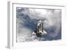 Space Shuttle Atlantis Above a Cloud Covered Earth-null-Framed Photographic Print