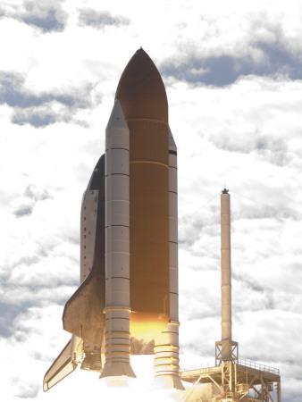 https://imgc.allpostersimages.com/img/posters/space-shuttle-atlantis-lifts-off-from-its-launch-pad-at-kennedy-space-center-florida_u-L-PC2UK50.jpg?artPerspective=n
