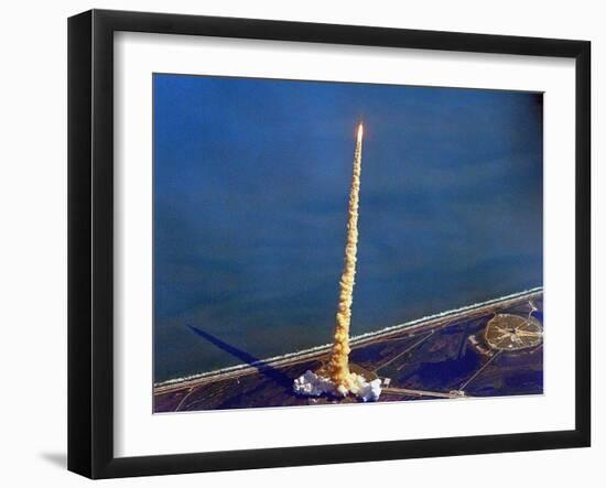 Space Shuttle Columbia on a Pillar of Exhaust as it Begins its Ten-Day Mission on Oct 22, 1992-null-Framed Photo