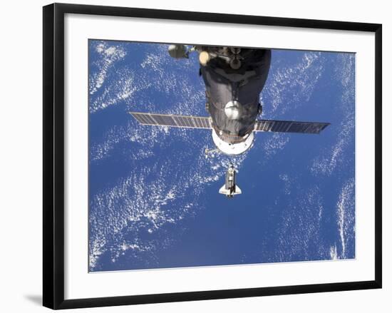 Space Shuttle Discovery Approaches the International Space Station-Stocktrek Images-Framed Premium Photographic Print