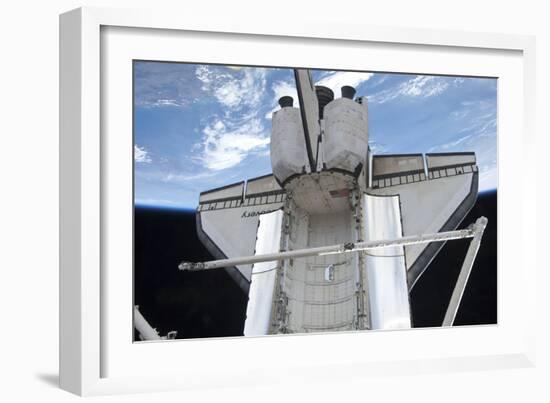 Space Shuttle Discovery Backdropped by Earth's Horizon-null-Framed Photographic Print