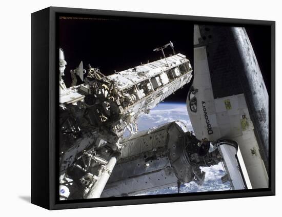 Space Shuttle Discovery Docked to the International Space Station-Stocktrek Images-Framed Stretched Canvas