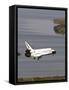 Space Shuttle Discovery Glides over the Banana River to a Landing on Kennedy Space Center's Runway-null-Framed Stretched Canvas