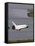 Space Shuttle Discovery Glides over the Banana River to a Landing on Kennedy Space Center's Runway-null-Framed Stretched Canvas