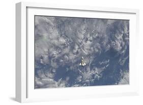 Space Shuttle Endeavour Backdropped by a Colorful Earth-null-Framed Photographic Print