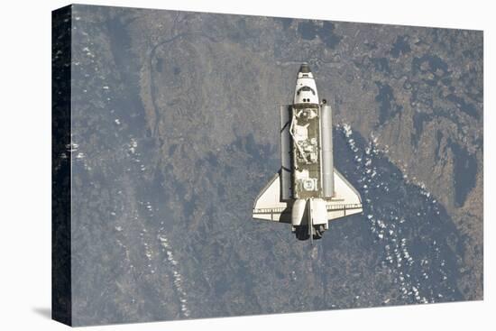 Space Shuttle Endeavour Backdropped by a Colorful Earth-null-Stretched Canvas