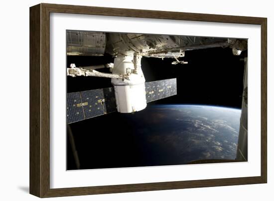 Spacex Dragon During its Docking with the International Space Station-null-Framed Photographic Print