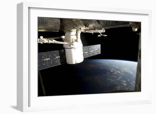 Spacex Dragon During its Docking with the International Space Station-null-Framed Photographic Print