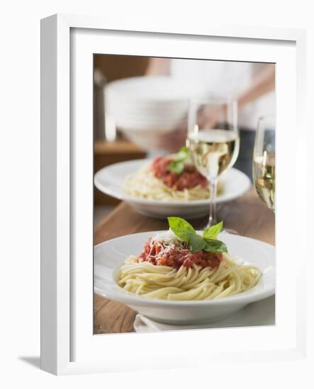 Spaghetti with Tomato Sauce and Glasses of White Wine on Table-null-Framed Photographic Print