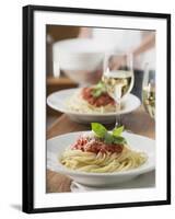 Spaghetti with Tomato Sauce and Glasses of White Wine on Table-null-Framed Photographic Print