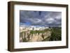 Spain, Andalusia. Ronda perches on the rugged defensible limestone cliffs.-Brenda Tharp-Framed Photographic Print