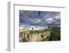 Spain, Andalusia. Ronda perches on the rugged defensible limestone cliffs.-Brenda Tharp-Framed Photographic Print