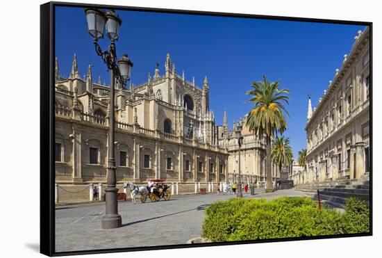 Spain, Andalusia, Seville, Cathedral, Street, Horse-Drawn Carriage-Chris Seba-Framed Stretched Canvas