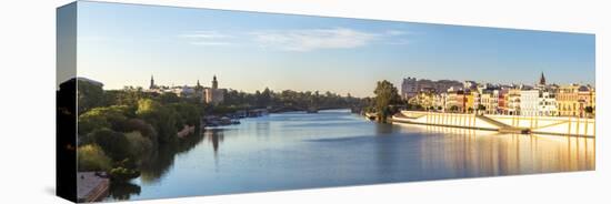 Spain, Andalusia, Seville. Triana District at Sunrise with Guadalquivir River-Matteo Colombo-Stretched Canvas