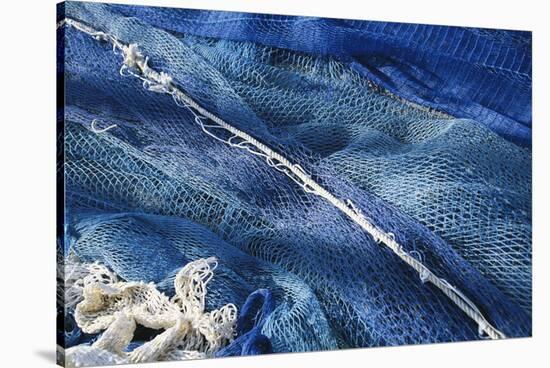 Spain, Balearic Islands, Menorca, Fishing Net at Port of Mao-Walter Bibikow-Stretched Canvas