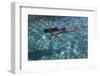 Spain, Ibiza, Cala Jondal. Girl Swimming at Maison De Bang Bang Villa-Katie Garrod-Framed Photographic Print