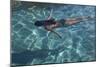 Spain, Ibiza, Cala Jondal. Girl Swimming at Maison De Bang Bang Villa-Katie Garrod-Mounted Photographic Print