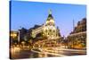 Spain, Madrid. Cityscape at Dusk with Famous Metropolis Building-Matteo Colombo-Stretched Canvas