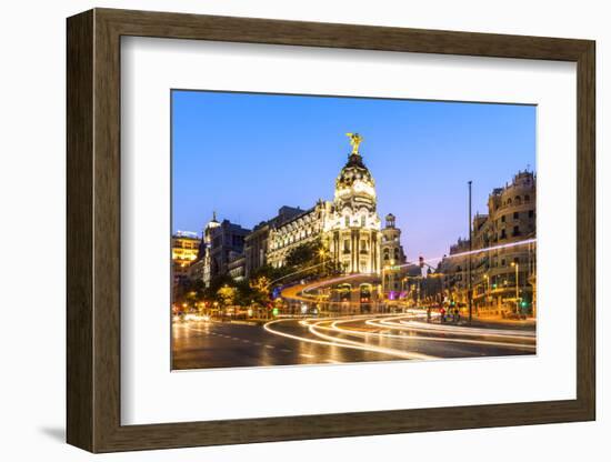 Spain, Madrid. Cityscape at Dusk with Famous Metropolis Building-Matteo Colombo-Framed Photographic Print