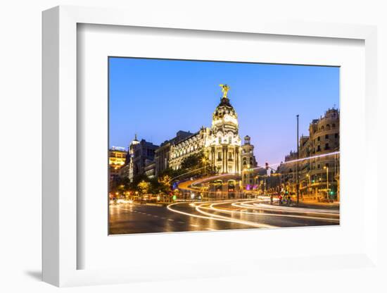 Spain, Madrid. Cityscape at Dusk with Famous Metropolis Building-Matteo Colombo-Framed Photographic Print