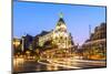 Spain, Madrid. Cityscape at Dusk with Famous Metropolis Building-Matteo Colombo-Mounted Photographic Print