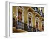 Spain, Sevilla, Andalucia Geraniums hang over iron balconies of traditional houses-Merrill Images-Framed Premium Photographic Print