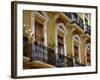 Spain, Sevilla, Andalucia Geraniums hang over iron balconies of traditional houses-Merrill Images-Framed Photographic Print