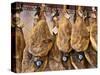 Spanish Hams Hanging in a Restaurant Bodega, Seville, Andalusia, Spain, Europe-Guy Thouvenin-Stretched Canvas