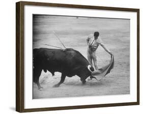 Spanish Matador Antonio Ordonez Executing Left Handed Pass Called "Pase Natural" During Bullfight-Loomis Dean-Framed Premium Photographic Print