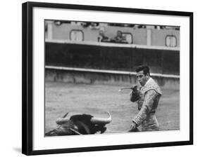 Spanish Matador, Antonio Ordonez Prepares to Kill the Charging Bull During Bullfight-Loomis Dean-Framed Premium Photographic Print