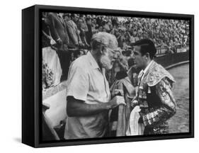 Spanish Matador Antonio Ordonez with Friend, Author Ernest Hemingway in Arena Before Bullfight-Loomis Dean-Framed Stretched Canvas