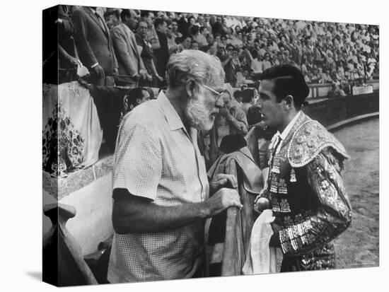 Spanish Matador Antonio Ordonez with Friend, Author Ernest Hemingway in Arena Before Bullfight-Loomis Dean-Stretched Canvas