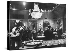 Sparse Crowd at a Casino at the Time of the Diplomatic Break with the Us-null-Stretched Canvas