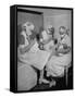 Special Nursery Nurses Wearing Masks as They Bottle-Feed Fully Developed Premature Babies-Hansel Mieth-Framed Stretched Canvas