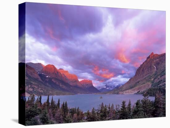 Spectacular Sunrise over Wild Goose Island in Glacier National Park, Montana, USA-Chuck Haney-Stretched Canvas