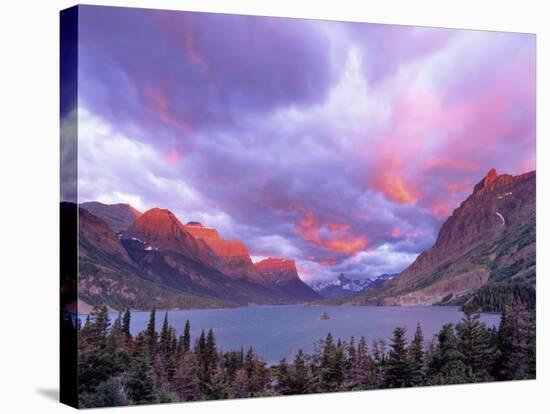 Spectacular Sunrise over Wild Goose Island in Glacier National Park, Montana, USA-Chuck Haney-Stretched Canvas