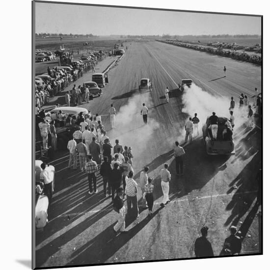 Spectators and Hot Rodders from the Nat. Hot Rod Assoc. at Drag Race on Quarter Mile Strip-Ralph Crane-Mounted Photographic Print