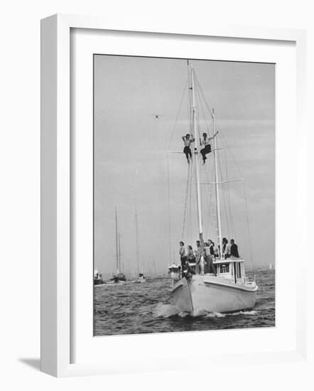 Spectators Watching the America's Cup on a Sailing Boat-Peter Stackpole-Framed Photographic Print