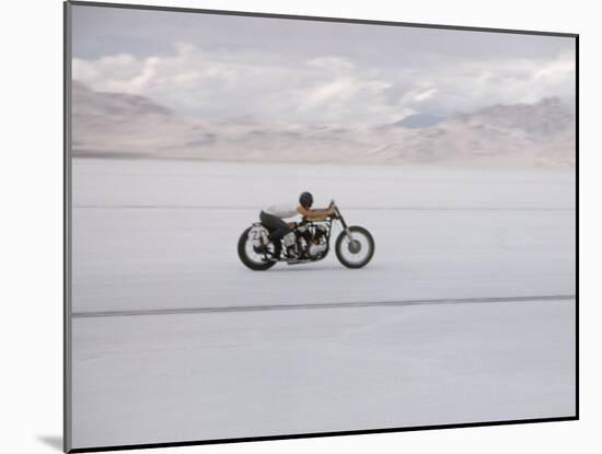 Speeding Motorcycle During Bonneville Hot Rod Meet at the Bonneville Salt Flats in Utah-J^ R^ Eyerman-Mounted Photographic Print