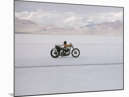 Speeding Motorcycle During Bonneville Hot Rod Meet at the Bonneville Salt Flats in Utah-J^ R^ Eyerman-Mounted Photographic Print