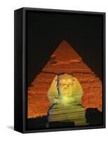 Sphinx and One of the Pyramids Illuminated at Night, Giza, Cairo, Egypt-Nigel Francis-Framed Stretched Canvas