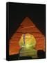 Sphinx and One of the Pyramids Illuminated at Night, Giza, Cairo, Egypt-Nigel Francis-Framed Stretched Canvas