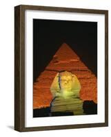 Sphinx and One of the Pyramids Illuminated at Night, Giza, Cairo, Egypt-Nigel Francis-Framed Photographic Print