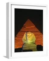 Sphinx and One of the Pyramids Illuminated at Night, Giza, Cairo, Egypt-Nigel Francis-Framed Photographic Print