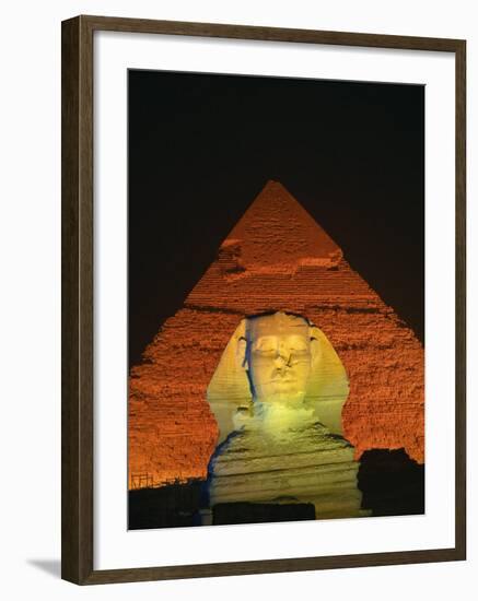 Sphinx and One of the Pyramids Illuminated at Night, Giza, Cairo, Egypt-Nigel Francis-Framed Photographic Print