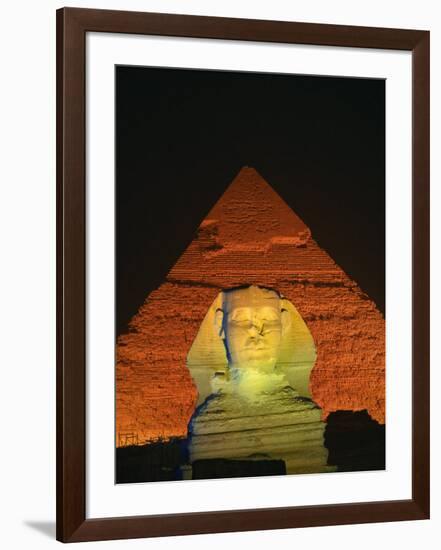 Sphinx and One of the Pyramids Illuminated at Night, Giza, Cairo, Egypt-Nigel Francis-Framed Photographic Print