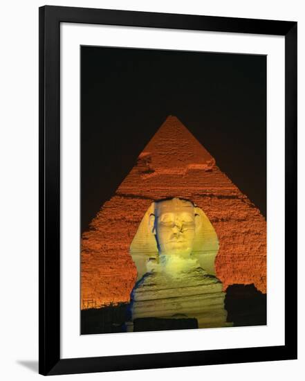 Sphinx and One of the Pyramids Illuminated at Night, Giza, Cairo, Egypt-Nigel Francis-Framed Photographic Print