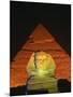 Sphinx and One of the Pyramids Illuminated at Night, Giza, Cairo, Egypt-Nigel Francis-Mounted Photographic Print