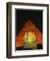 Sphinx and One of the Pyramids Illuminated at Night, Giza, Cairo, Egypt-Nigel Francis-Framed Photographic Print