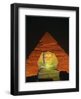 Sphinx and One of the Pyramids Illuminated at Night, Giza, Cairo, Egypt-Nigel Francis-Framed Photographic Print